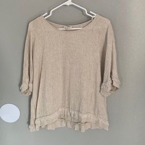Tan blouse with Raw Edge Detail